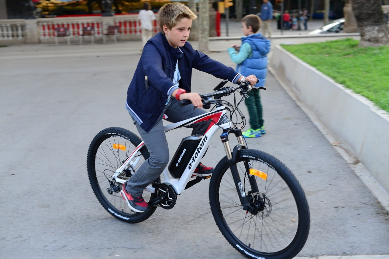 Child on an e-bike.